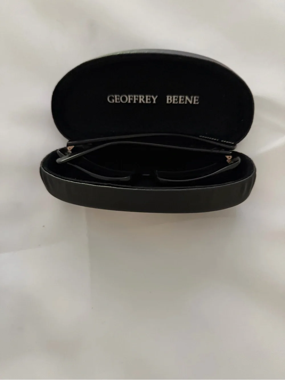 Geoffrey Beene Women's Black Sunglasses with Matching Black Case
